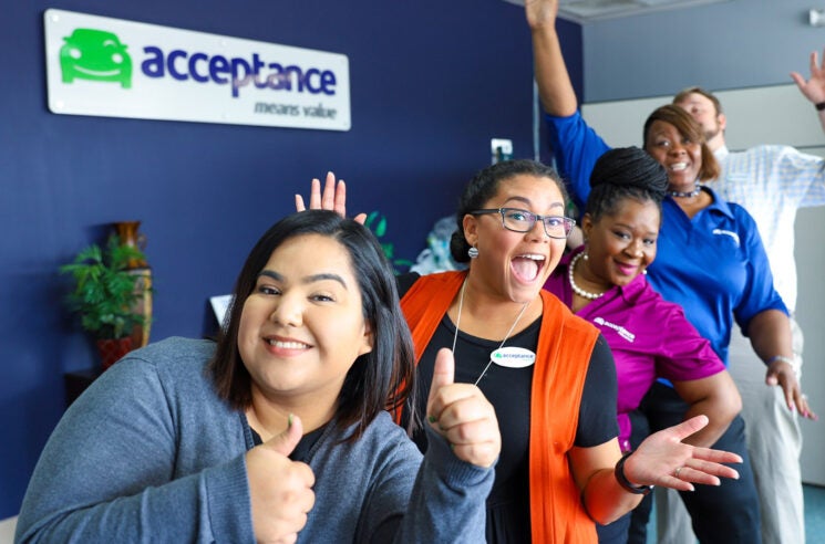 Five Acceptance Insurance team members