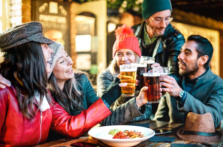 Friends toasting with beer
