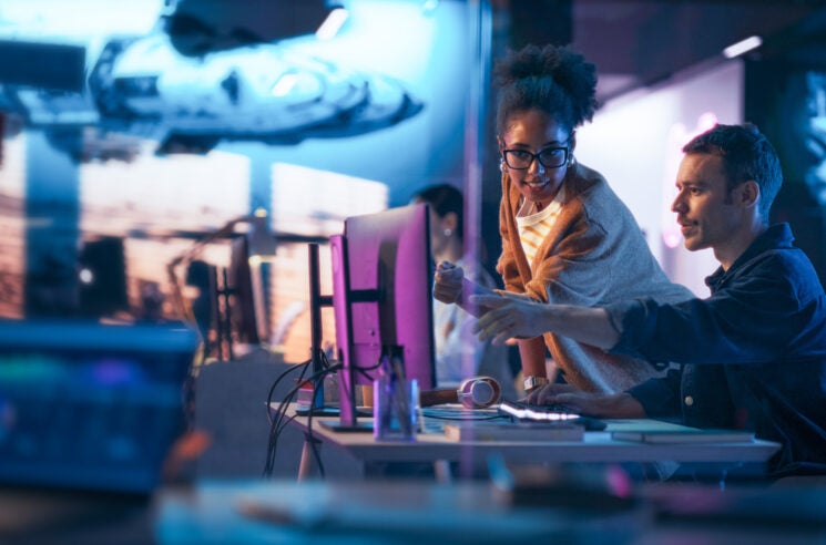 AI generated image of man and woman working at computer