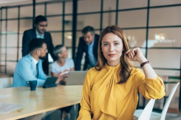 woman at conference table